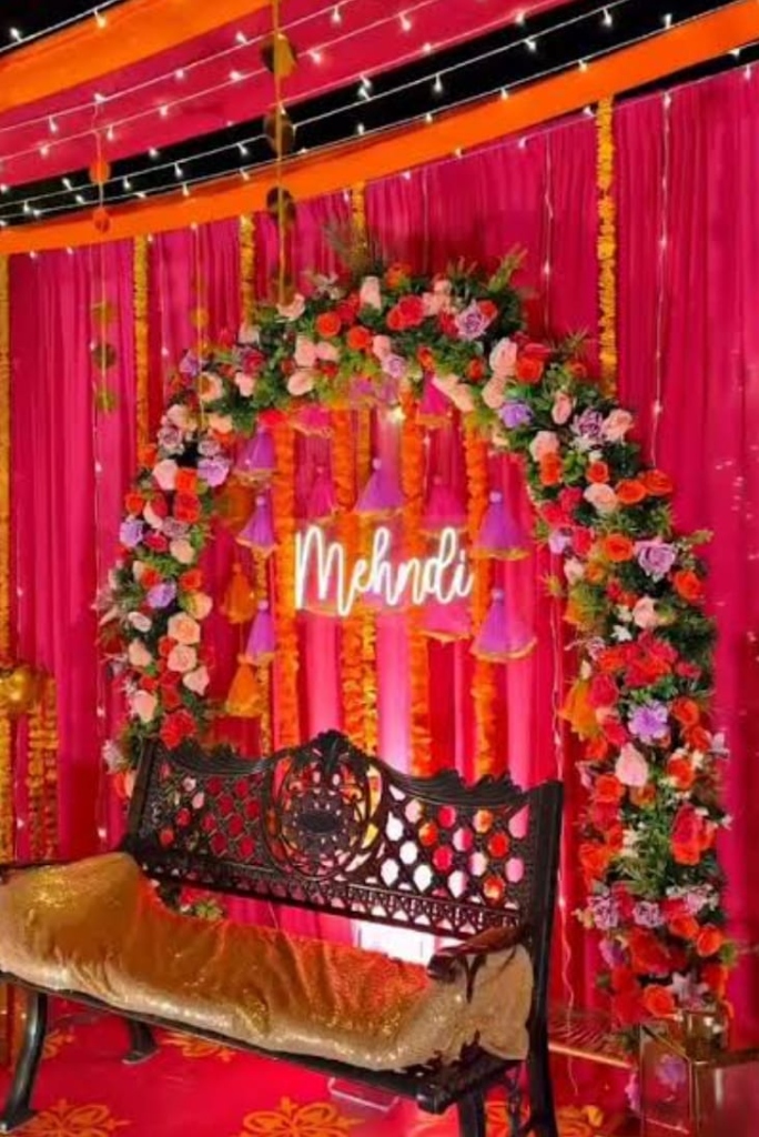 Vibrant Fuchsia Backdrop with Neon Sign & Swings