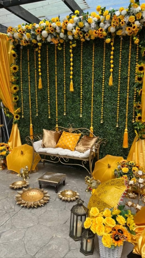 Lush Greenery Backdrops with Yellow Umbrellas & Iron Swings