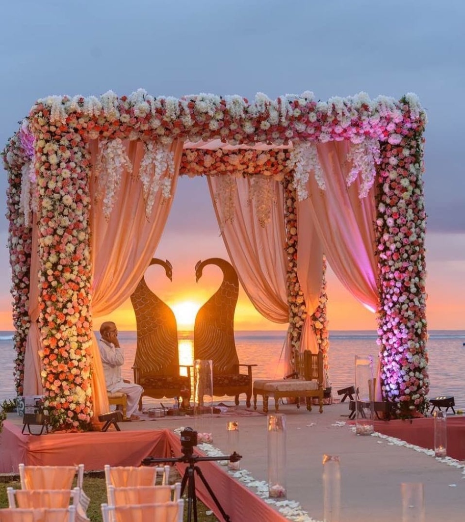 Sunset Beach Mandap Covered in Roses & Swans